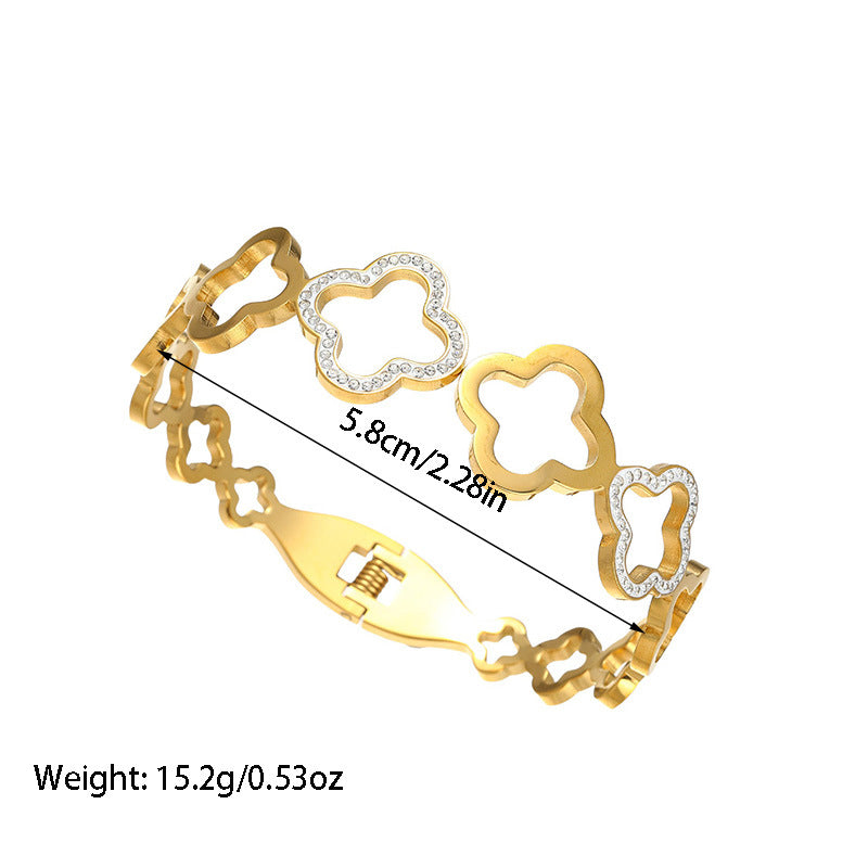 Hollow four-leaf clover bracelet with diamond spring buckle bracelet
